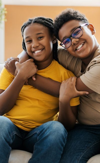 smiling-children-hugging-together-tenderly.jpg